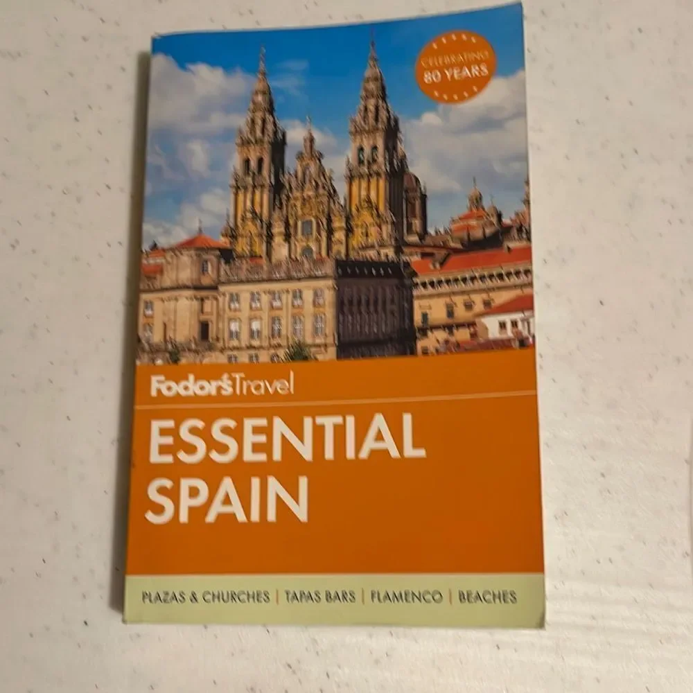 Essential Spain Travel Guide Book.‎ A must have for you next trip!